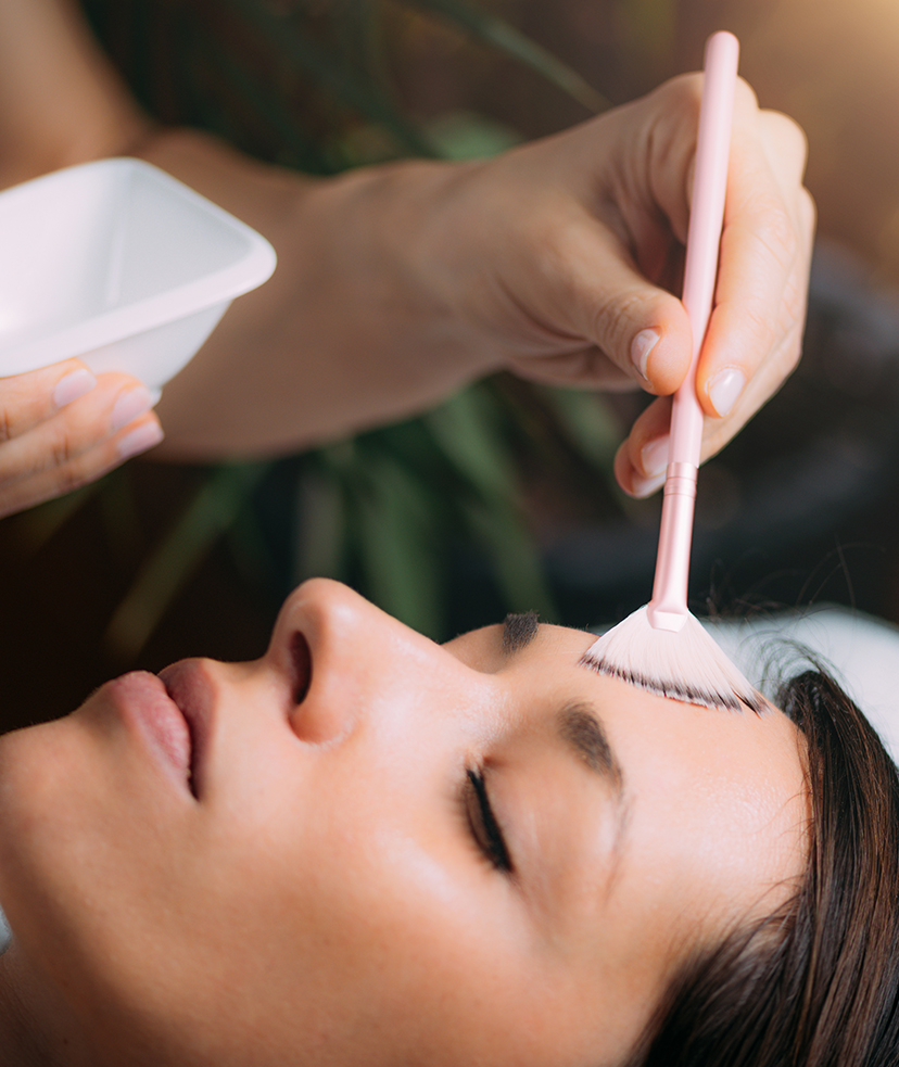 Photo of a woman getting a chemical peel