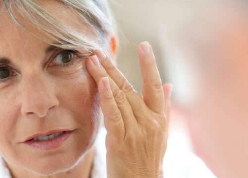 Photo of an older woman with facial wrinkles